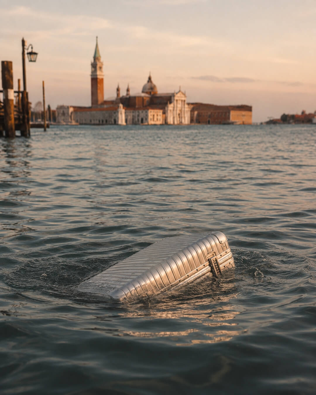 A suitcase is sinking in Venice